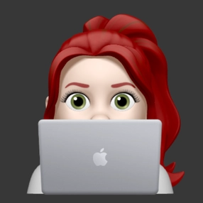 graphic of a redhead woman with a ponytail behind a laptop computer